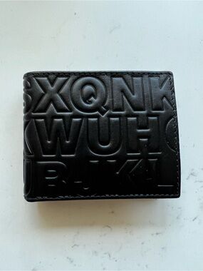 Comme des Garcons Black Embossed Leather Wallet